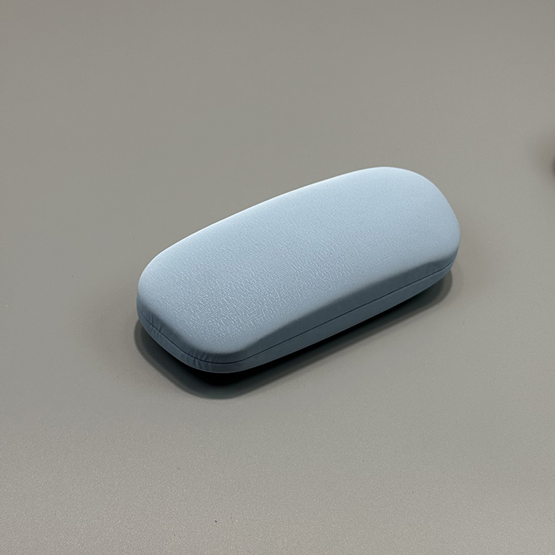 Simple sensación de piel japonesa inclinada caja de gafas de la moda pequeña sensación de alta calidad caja de gafas de estudiantes caja de miopía portátil