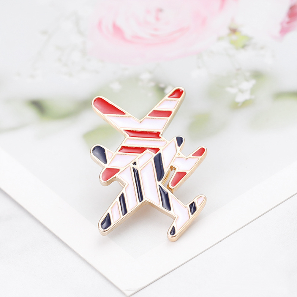 Europeo y americano transfronterizo deseo nuevo broche de moda personalizada aleación rayas combate aviones broche bolsa ropa