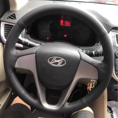 Steering wheel cover: special all-inclusive hand-sewn