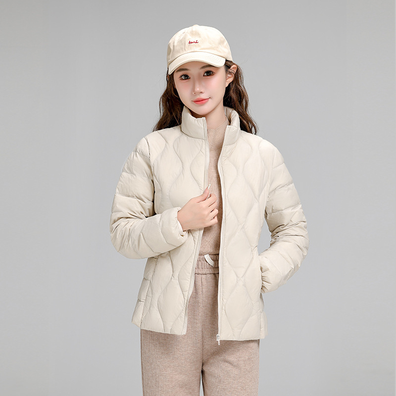 Chaqueta de plumón casual ligera de mujer moda polifacética blanca ligera caliente invierno y otoño abrigo delgado grande