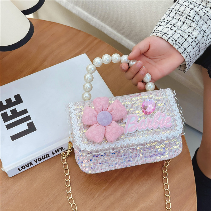 Bolso de los nuevos niños al por mayor bolso de princesa Linda pequeña flor arco accesorios bolsa versátil bolsa de mensajero de las muchachas
