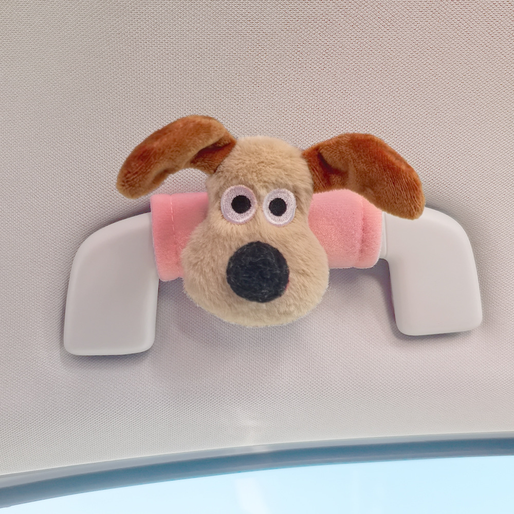 Perro de peluche maneja de automóvil maneja de automóvil masculino y femenino maneja de puerta interior cubierta guante de techo