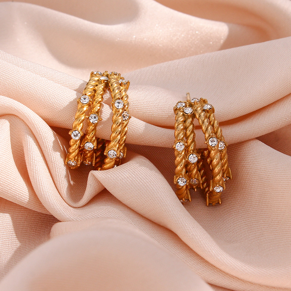 Fashion Stainless Steel Multi-layer Twist Zircon Banana Shape Earrings display picture 2