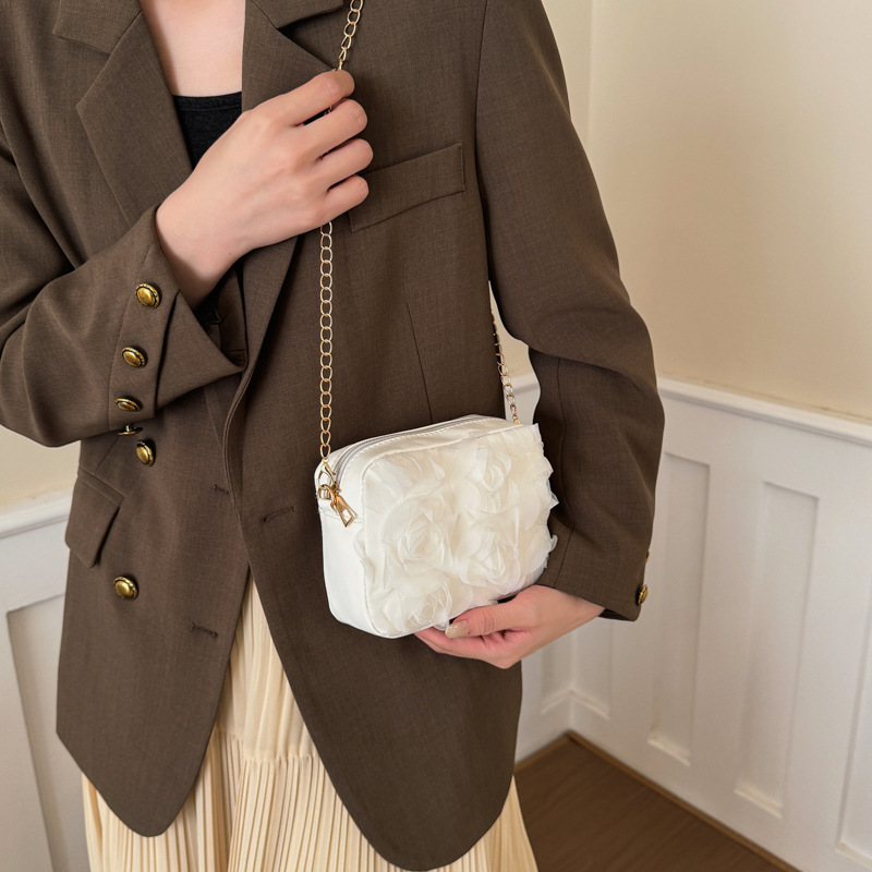 Nuevos accesorios para niños coreanos bolsos de encaje dulce flor tridimensional bolsos de mano frescos bolsos pequeños para hombres y mujeres