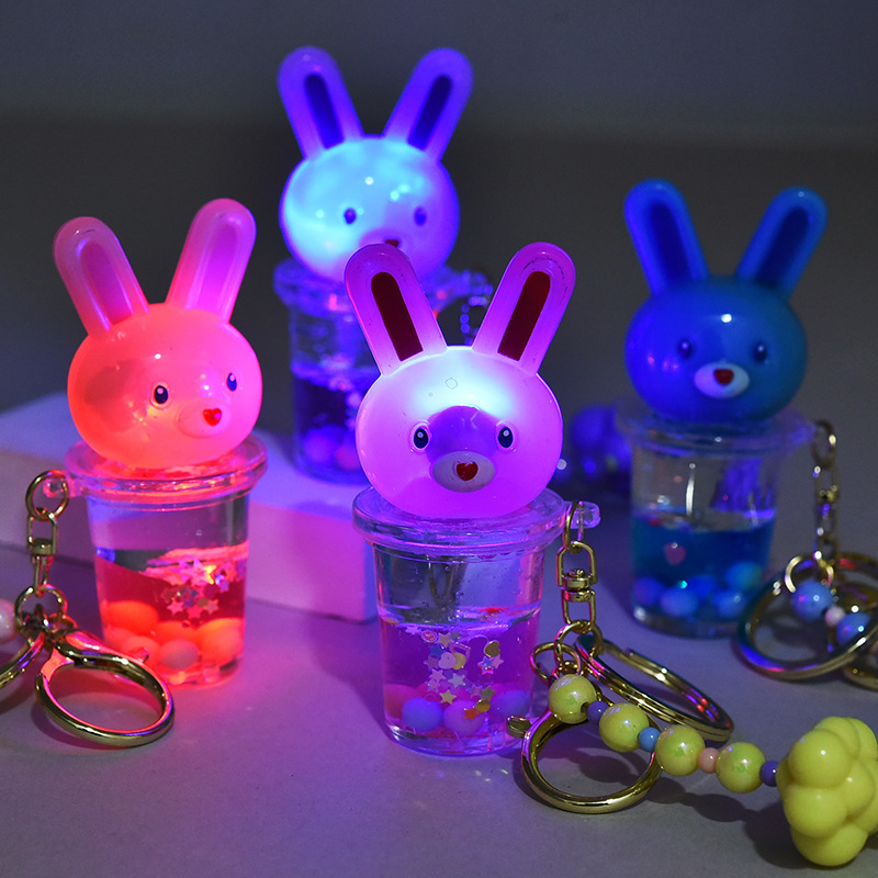 New luminous rabbit quicksand bottle keychain cute couple student schoolbag key chain personalized car small pendant