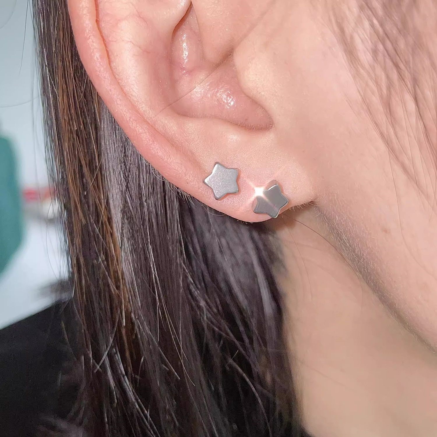 Orecchini a lobo a forma di stella in acciaio inox donna_voghion.com