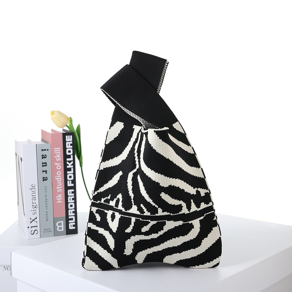 2024 Flying Weaving Bag Tote Bag Versión coreana del nuevo bolso de mano de moda Fabricante de bolsas de compras casuales de gran capacidad para estudiantes