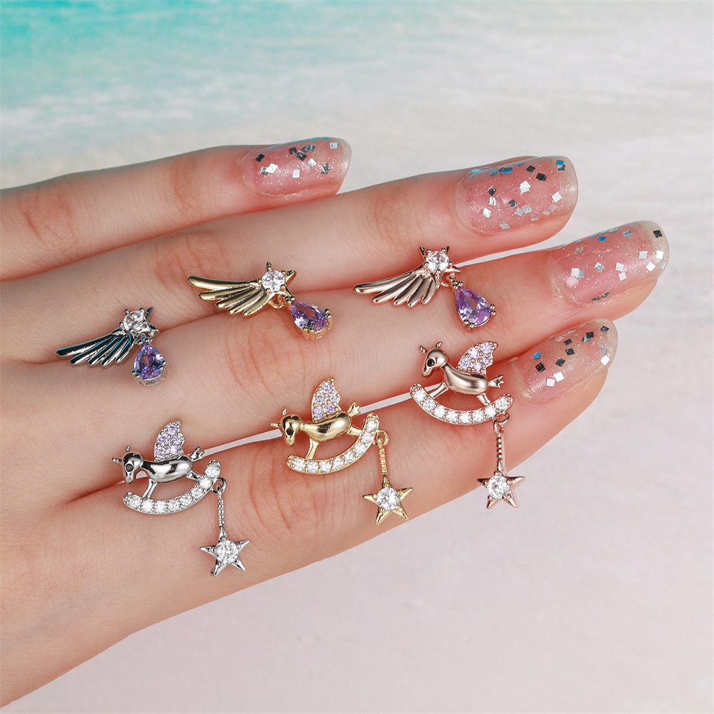 angel wings ear bone nails creative piercing asymmetric earrings