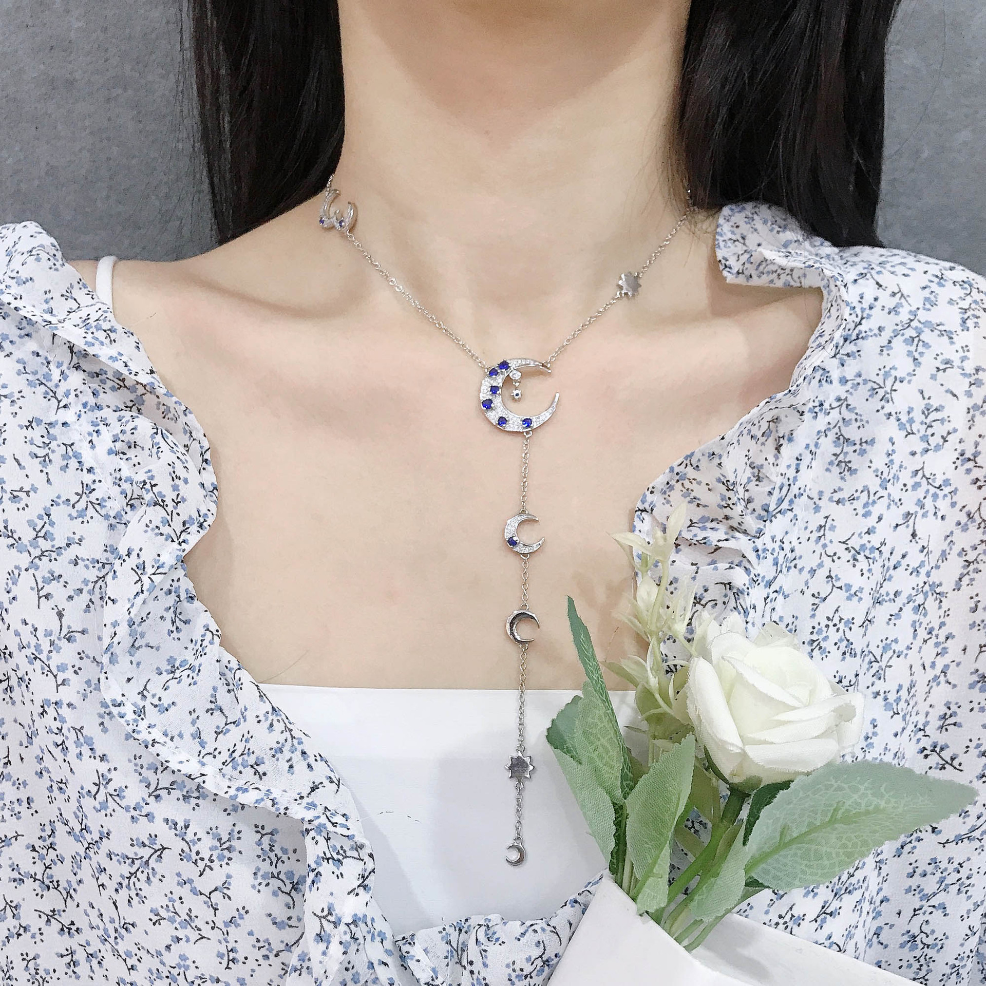 Niche Ins Style Micro Inlaid Zircon Star Moon Y-shaped Mid-length Clavicle Chain Dark Blue Sun Moon Star Necklace display picture 7