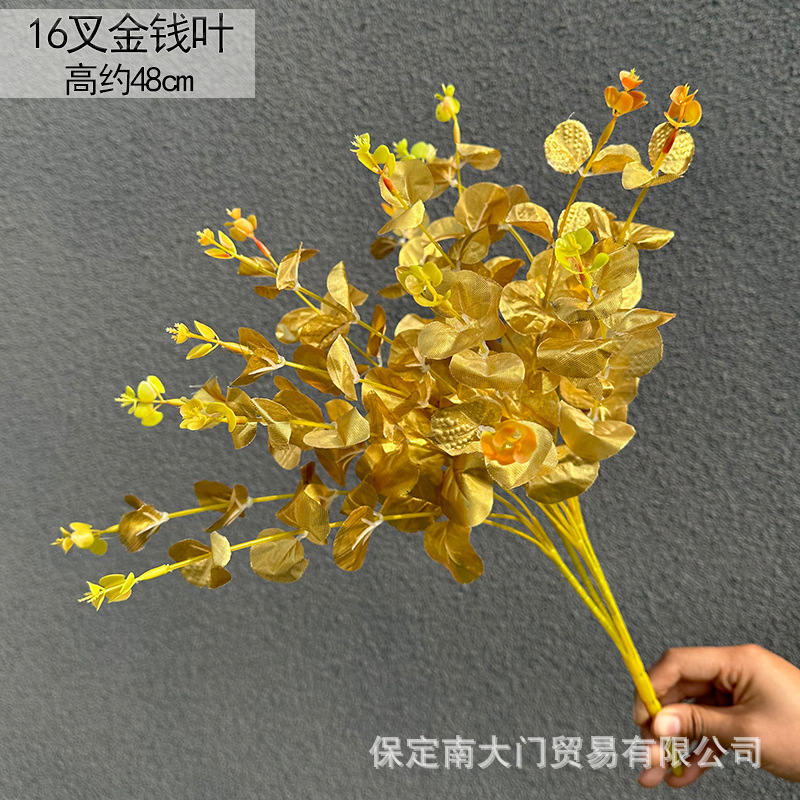 Flores artificiales doradas para Navidad