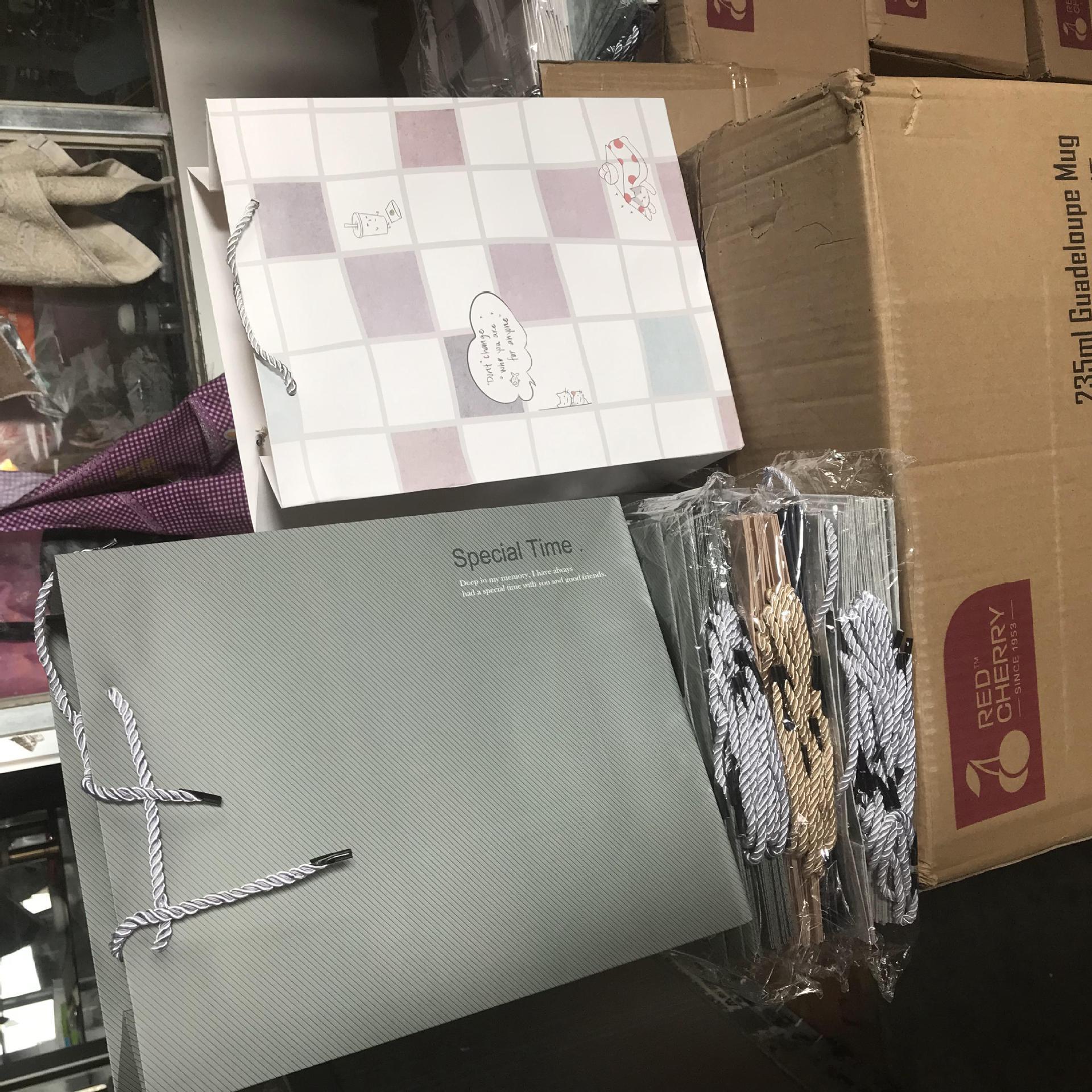 纸质大号礼品袋 收纳袋 书包手提袋两元店百货货源