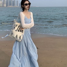 温柔风蓝色吊带连衣裙女夏季法式气质收腰显瘦海边度假A字长裙子