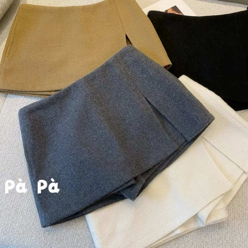 Горячая девушка черная двухслойная поперечная полулонная анти-легкая минималистская высокая талия тонкая юбка А-образного слова женская короткая дикая юбка бедра