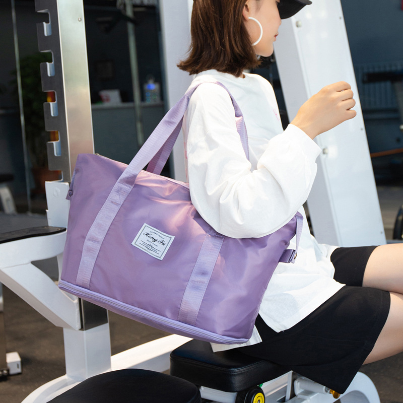 Bolsa de viaje de corta distancia portátil de gran capacidad bolsa de equipaje impermeable de moda para mujer bolsa de embarque de almacenamiento de viaje para hombres