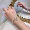 Sophisticated bracelet from pearl, zirconium, pendant, accessory, 14 carat