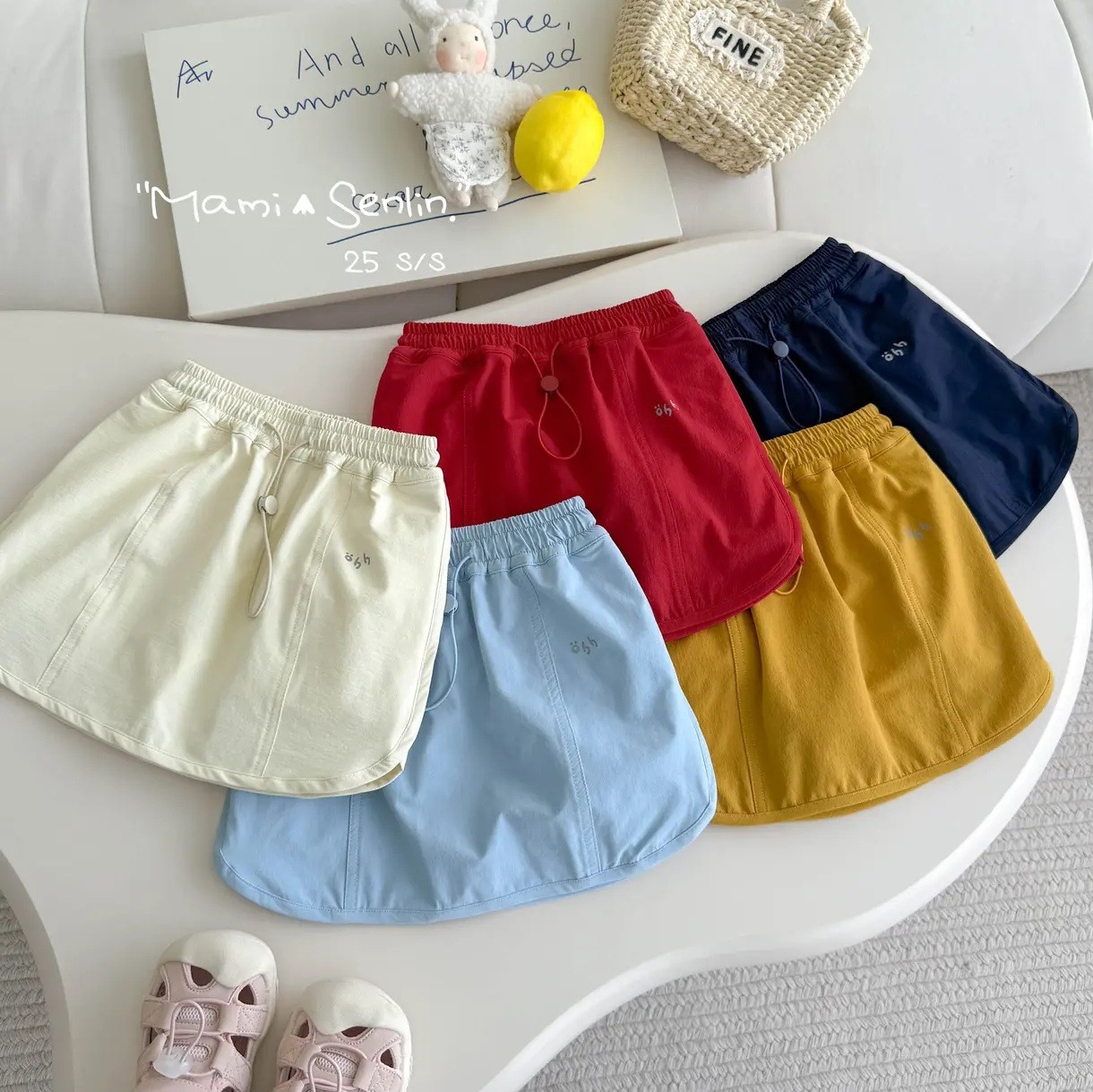 Xianning Seven Summer New Style Girls Casual All-Match Cordón Pantalones cortos de moda del tesoro femenino Falda para niños