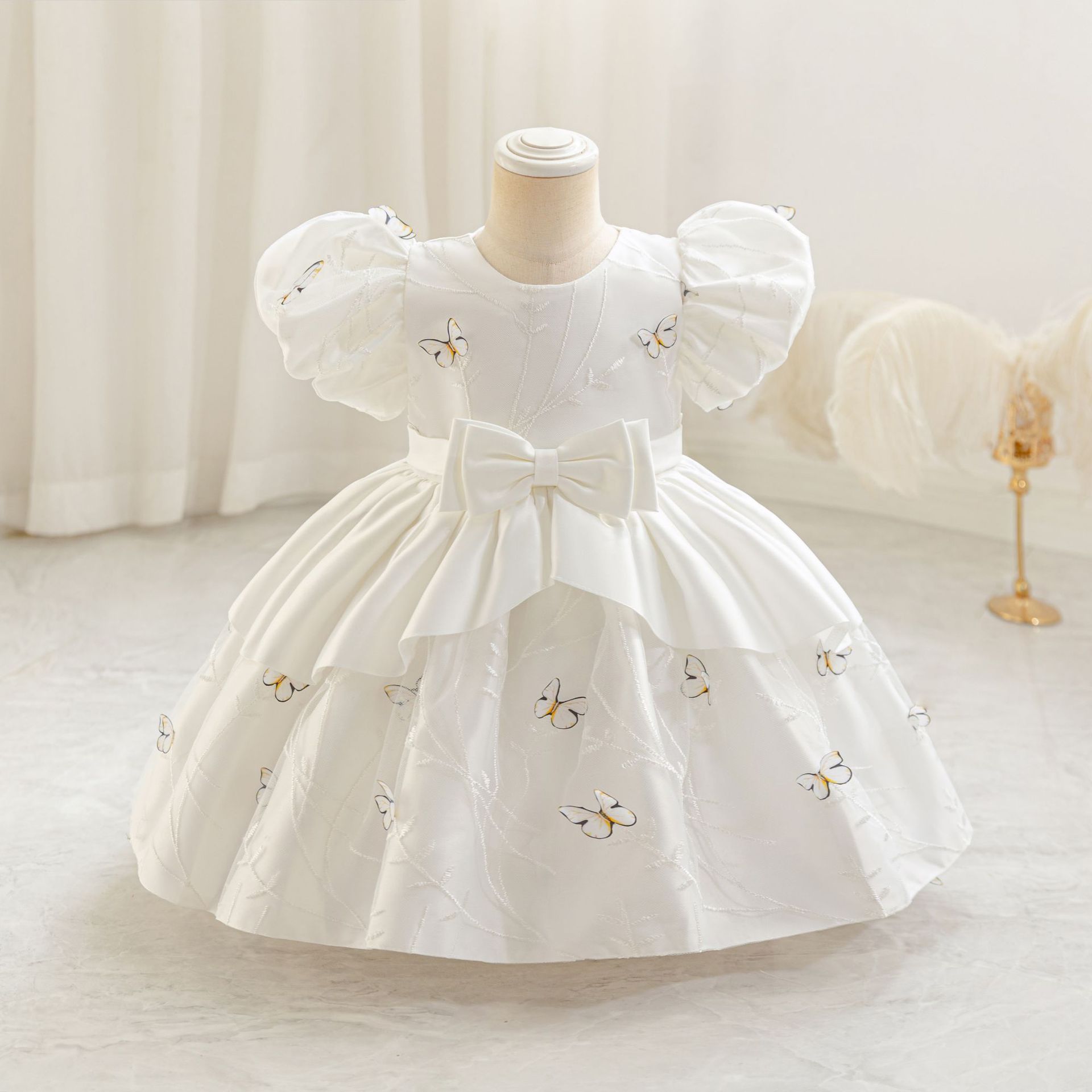 2025 nuevo bebé transfronterizo vestido infantil ropa de abrigo de arco vestido de bebé vestido vestido de abrigo al por mayor