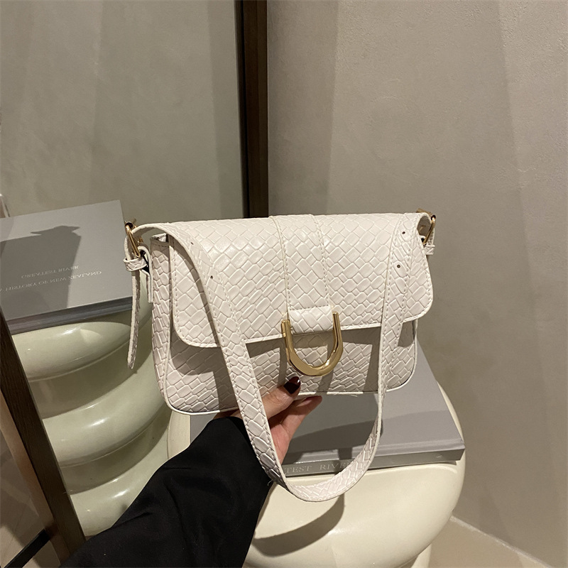 Bolsa de brazo de mujer trenzada retro 2025 primavera nueva bolsa de brazo en el temperamento bolso pequeño bolso cuadrado bolso mujer