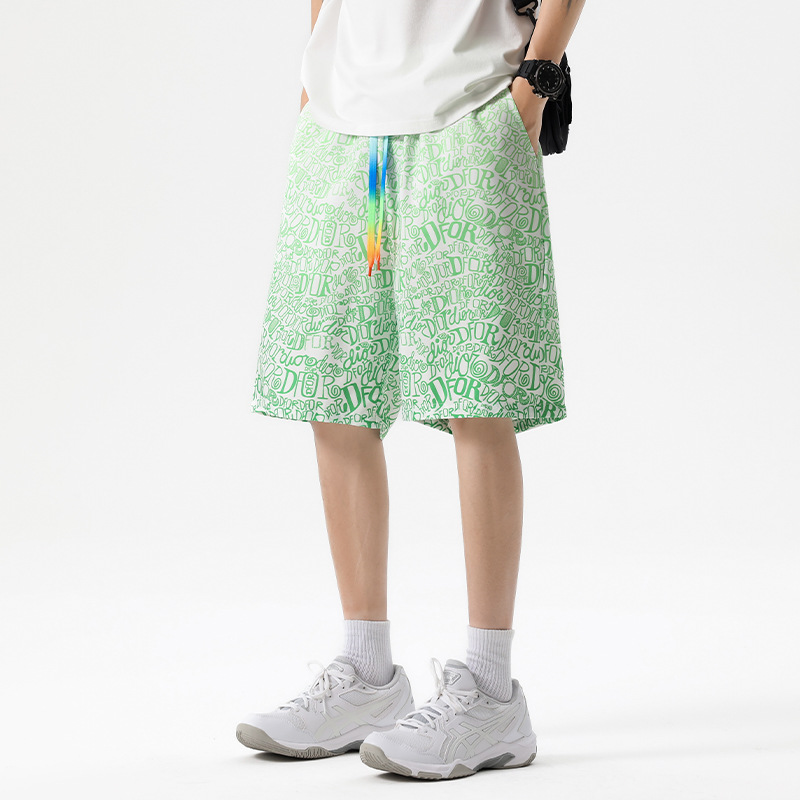 Verano nuevo estilo adolescente pantalones cortos deportivos moda casual gradiente pantalones cortos de camuflaje pantalones sueltos de playa