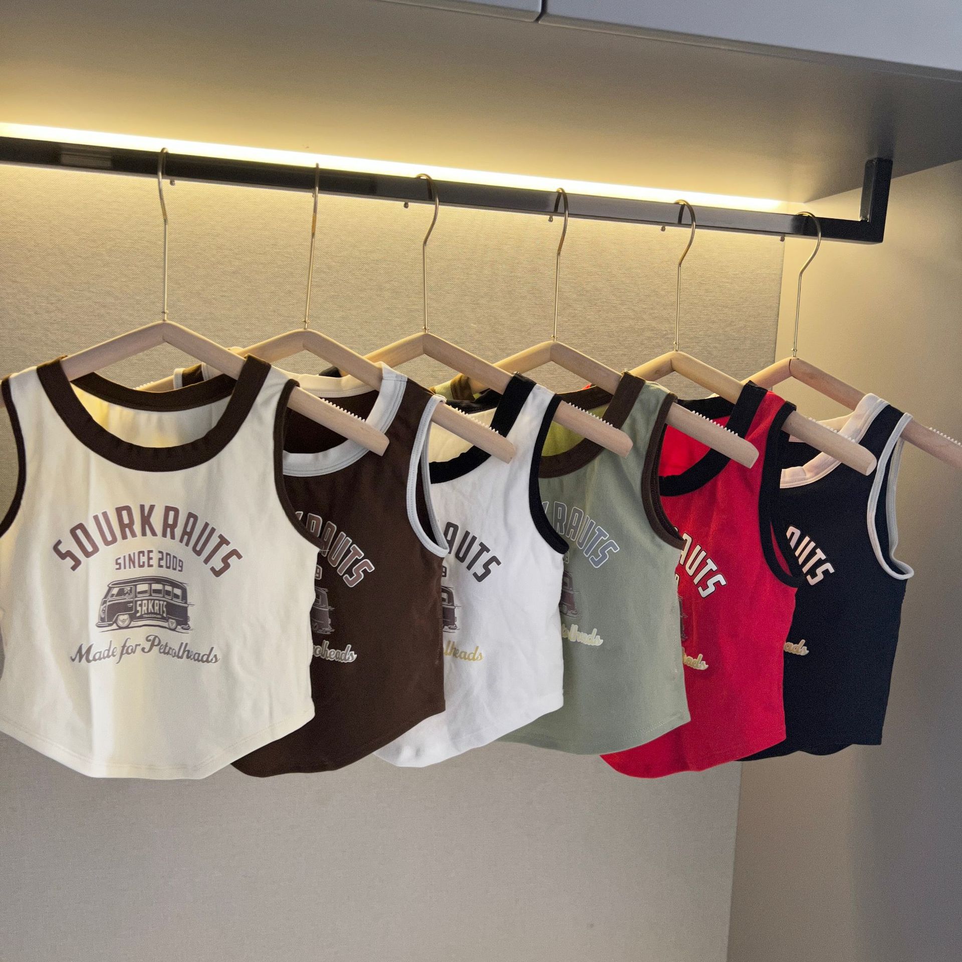 Nuevo estilo coreano letra camisola de las mujeres slim fit adelgazar desgaste exterior americano impresión contraste color corto de una pieza superior