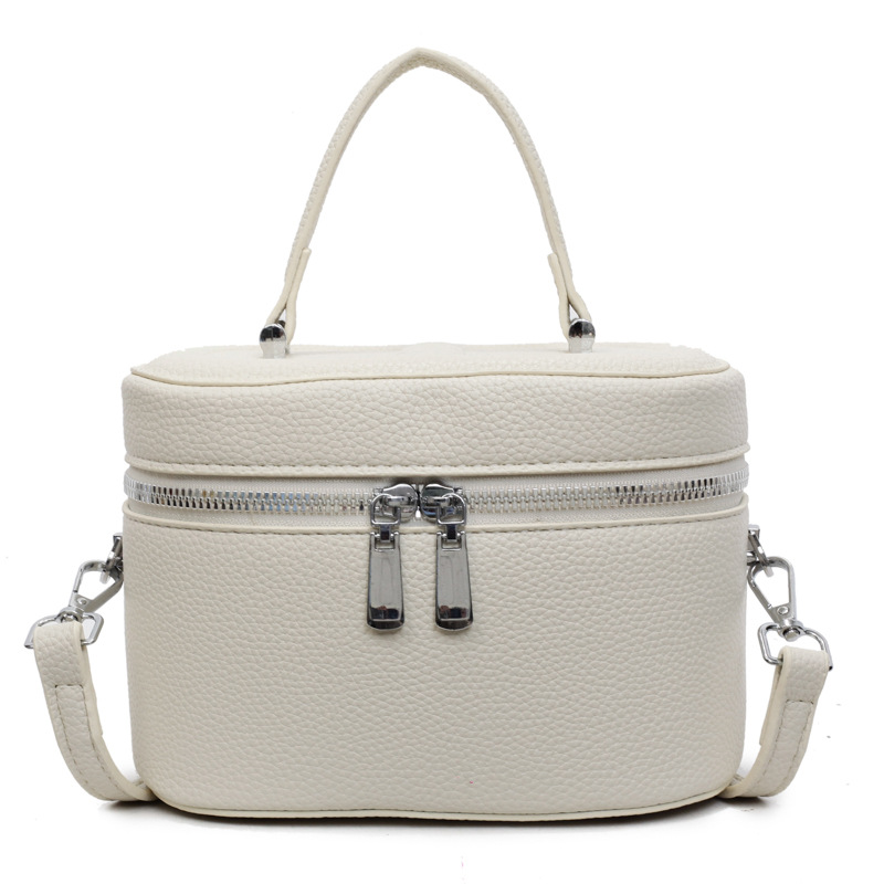 Bolso de cubo popular de este año 2025 verano nuevo bolso de hombro con patrón de lichi bolso de mensajero simple y versátil mujer