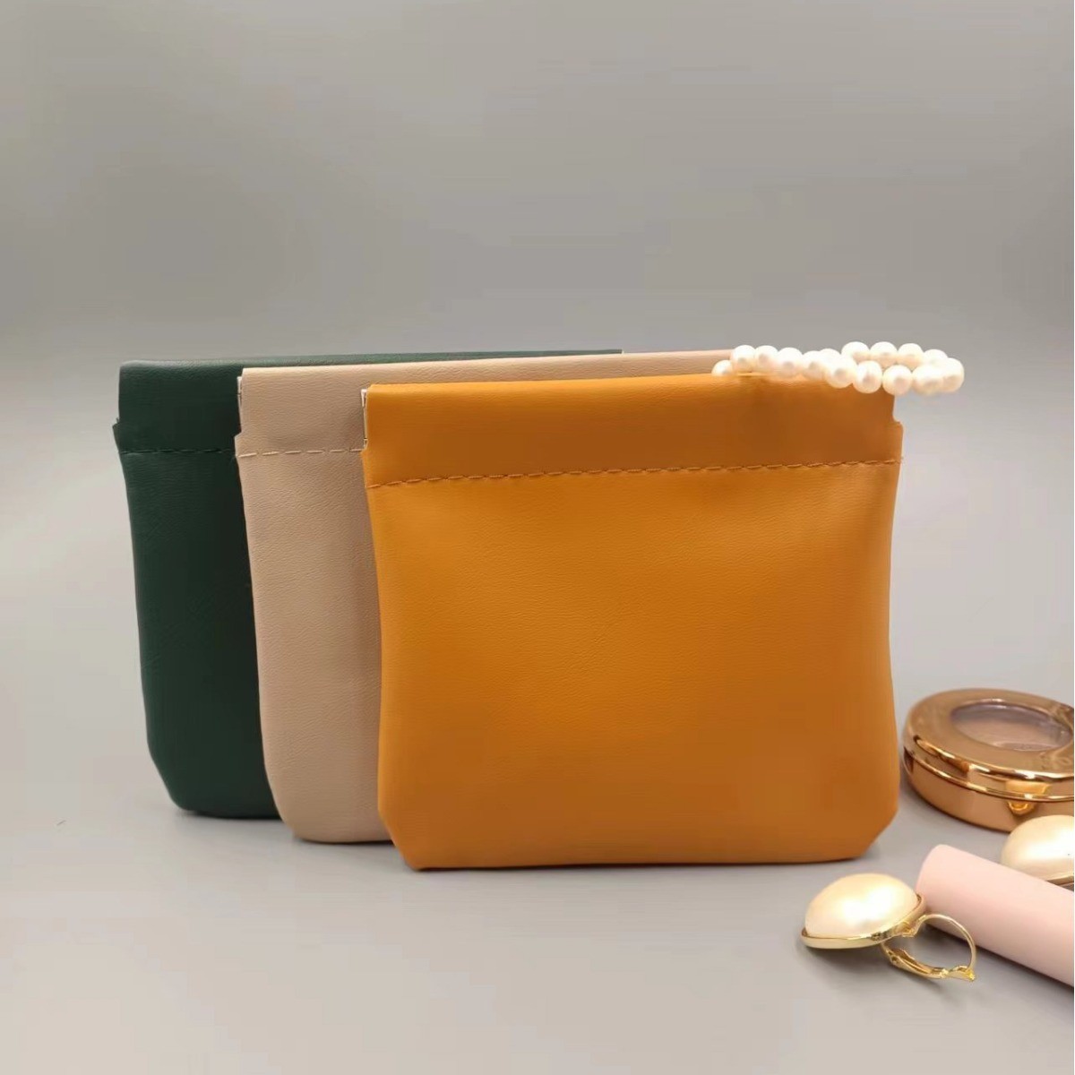 Exprimir metralla bolsa de cosméticos mini lápiz labial bolsa pu moneda monedero joyería bolsa de almacenamiento de auriculares bolsa de almacenamiento