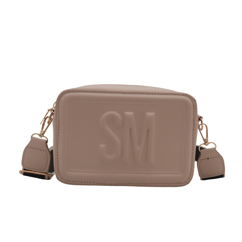 El estilo extranjero simple letras anchas cinturones de hombro mochila de hombro 2025 primavera nuevo color en bolsas casuales bolsas pequeñas