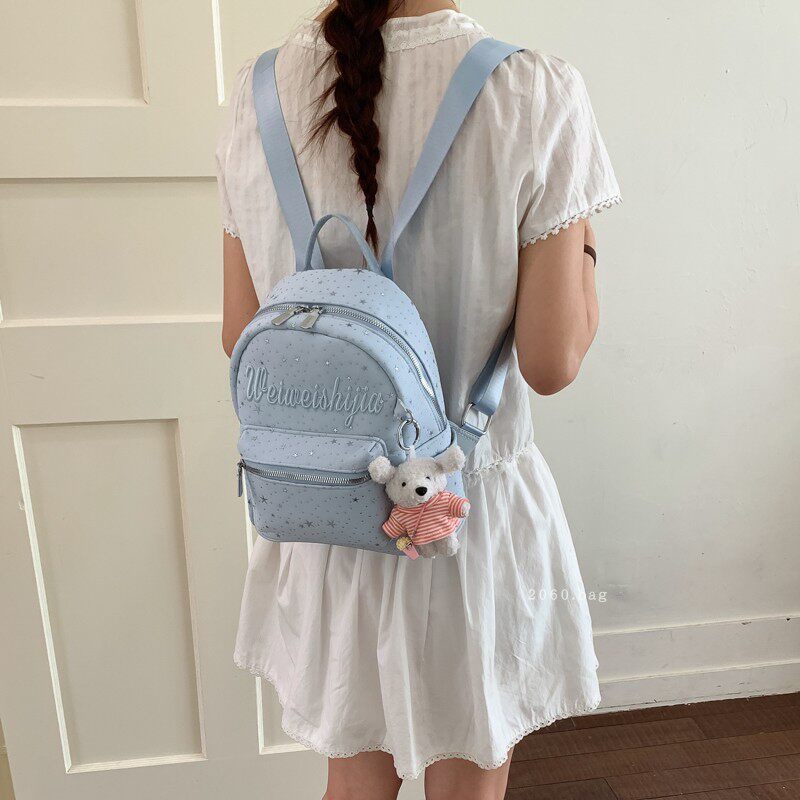 Mochila de moda mochila 2026 mochila de gran capacidad para estudiantes universitarios en clase nueva primavera bolsa de letras lienzo para mujeres