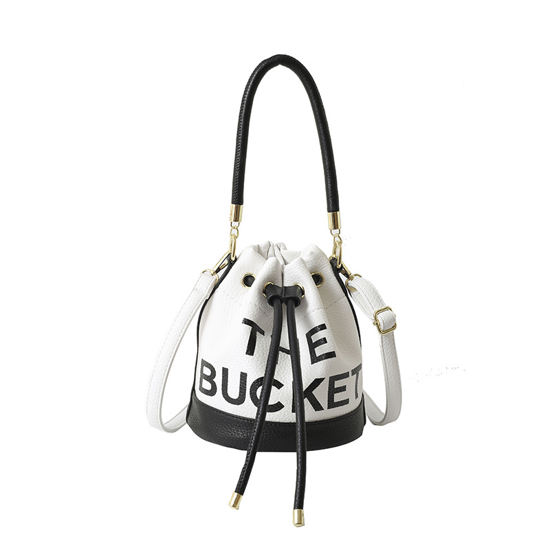 Bolso de hombro femenino casual todo-fósforo diseño de nicho sentido contraste color costuras cubo bolso de mano moda tendencia bandolera