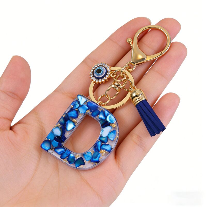 Cross-Border New Style Blue 26-Letter Resin Devil's Eye Keychain Fashion Personalized Tassel Bag Decoration Pendant Gift Cross-Border New Style Blue 26-Letter Resin Devil's Eye Keychain Fashion Personalized Tassel Bag Decoration Pendant Gift
