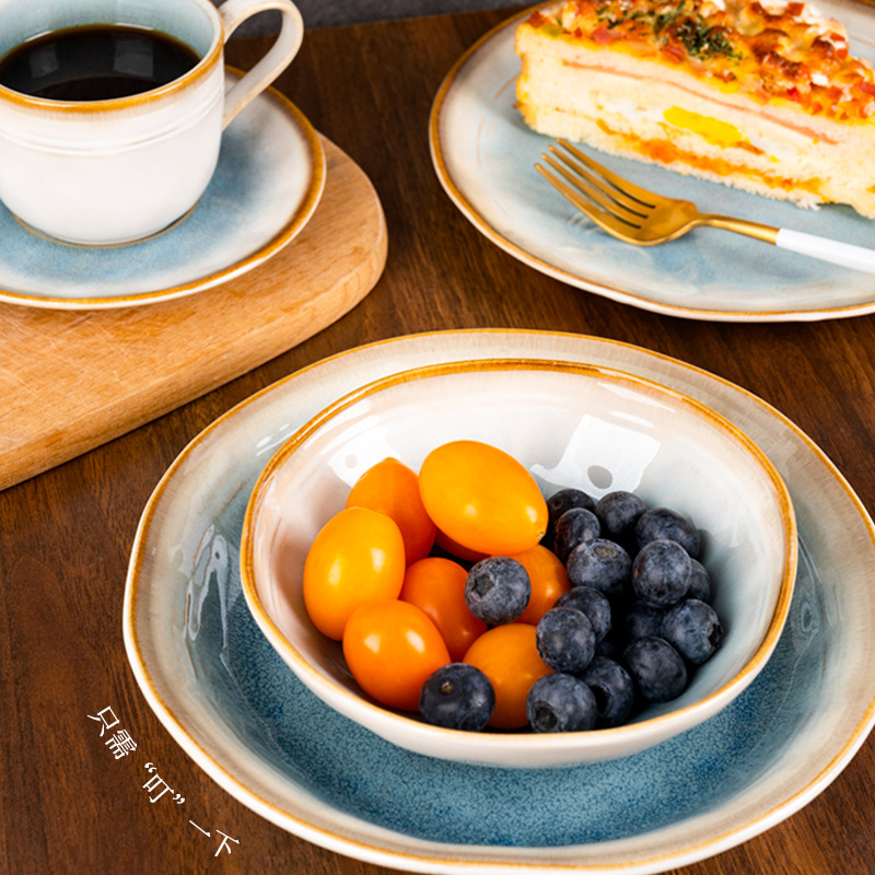 Fábrica de cerámica de Yuquan venta directa de platos de comedor caseros europeos platos de ensalada de forma especial platos de platos de cerámica de lujo ligeros platos
