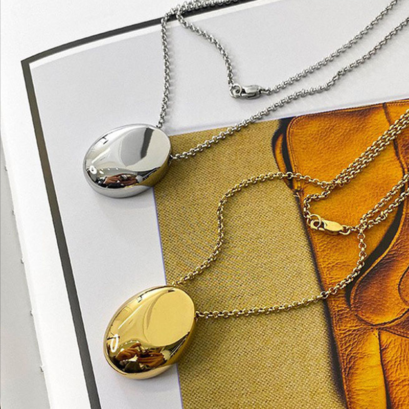 Colgante elíptico lujoso ligero estilo nicho personalidad collar de acero de titanio de mujer alta sensación nueva cadena de suéter no decolor