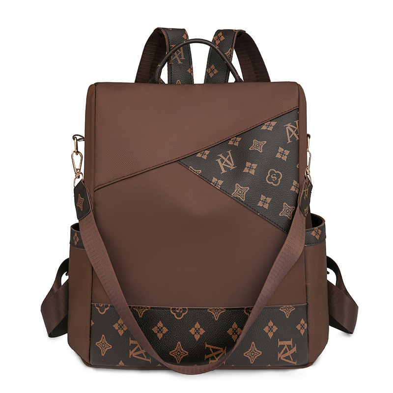 Comercio exterior al por mayor 2024 nueva mochila antirrobo de nailon para mujer retro, mochila multifuncional de doble uso de color de contraste de moda