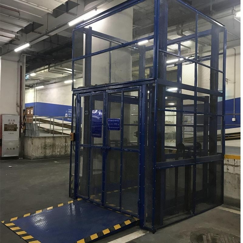 Plataforma elevadora fija de transporte de carga sobre rieles, elevador de carga hidráulico eléctrico para almacén, móvil para carga y descarga