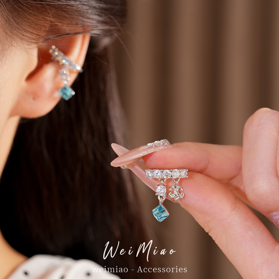 Zircon iris auriculares mujeres sin agujeros de orejas temperamento exquisito nicho pendientes de moda ligero lujo alta sensación auriculares al por mayor