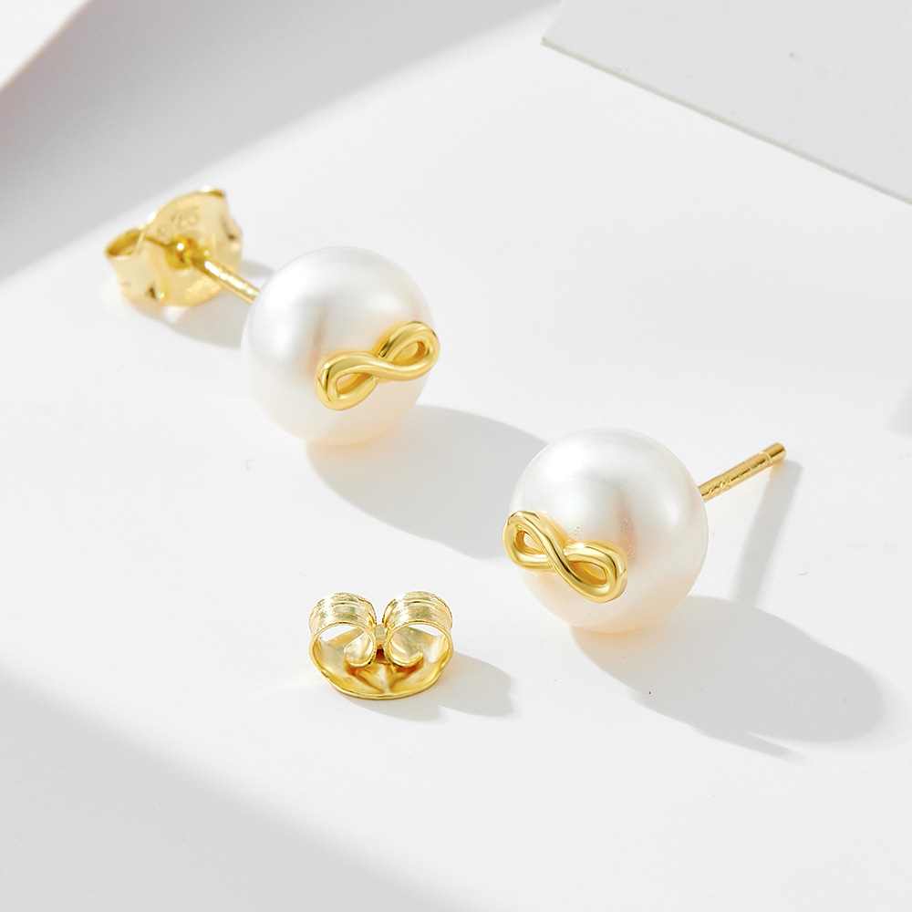 S925 plata de ley amor infinito Pendientes de perlas naturales de 8 caracteres Japonés coreano femenino Estilo Ins pequeños accesorios de orejas frescos de todo fósforo