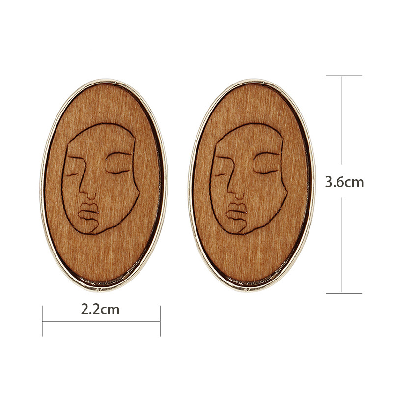 Bisutería Mayoreo Estilo Étnico Cara De Madera Patrón De Línea Pendientes Colgantes Redondos Nihaojewelry display picture 1