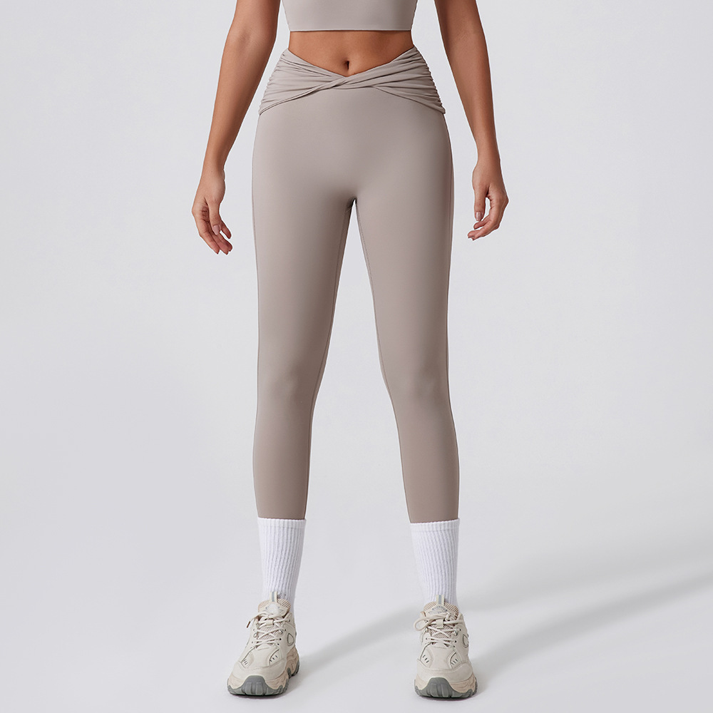 Europa y los Estados Unidos nuevos pantalones apretados rápidos y secos para mujeres torcer cintura alta y caderas pantalones deportivos para correr