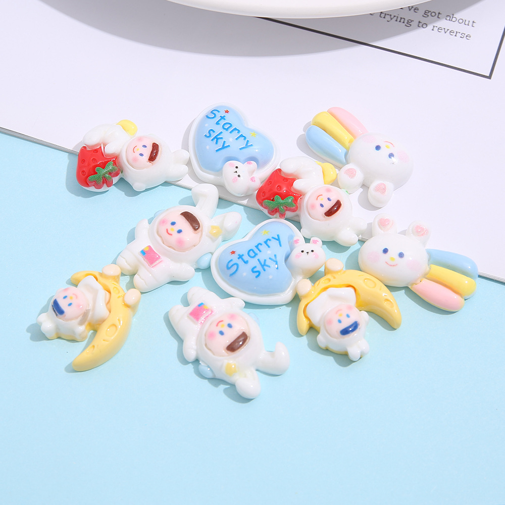 Nueva historieta brillante figura espacio resina accesorios DIY estrellado conejo teléfono caso accesorios de pelo zapato hebilla material hecho a mano al por mayor