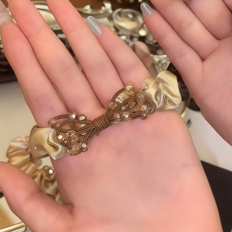 Cuerdas de cabello de viento pastoral pequeñas y altos valores faciales, anillo de cabello de intestino grande, sensación de una niña de banda de goma flácida, cuerdas de malla de banda de bola de cabeza