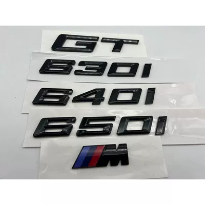 Suitable for BMW's new GT 630i, 640i, and 650i models; includes glossy black emblems, lettering, and rear emblems