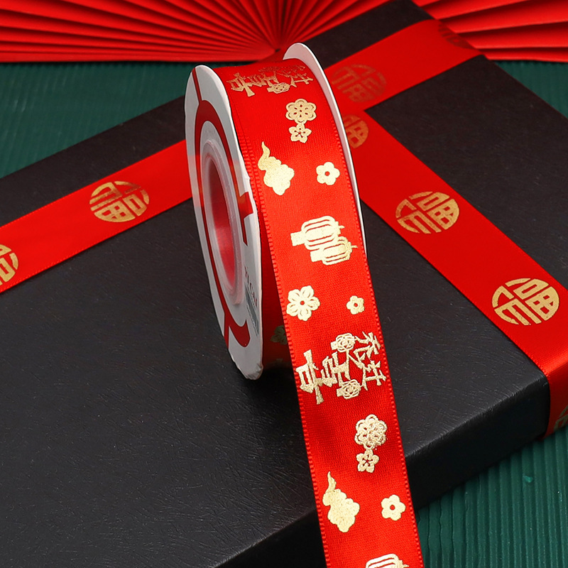 핫 스탬핑 리본은 폭 약 2.5cm, 길이 22.8cm입니다.