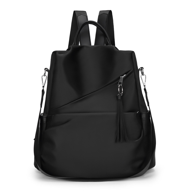 2023 nuevas damas casuales tela Oxford mochila antirrobo moda borla mochila de viaje multifuncional cabello