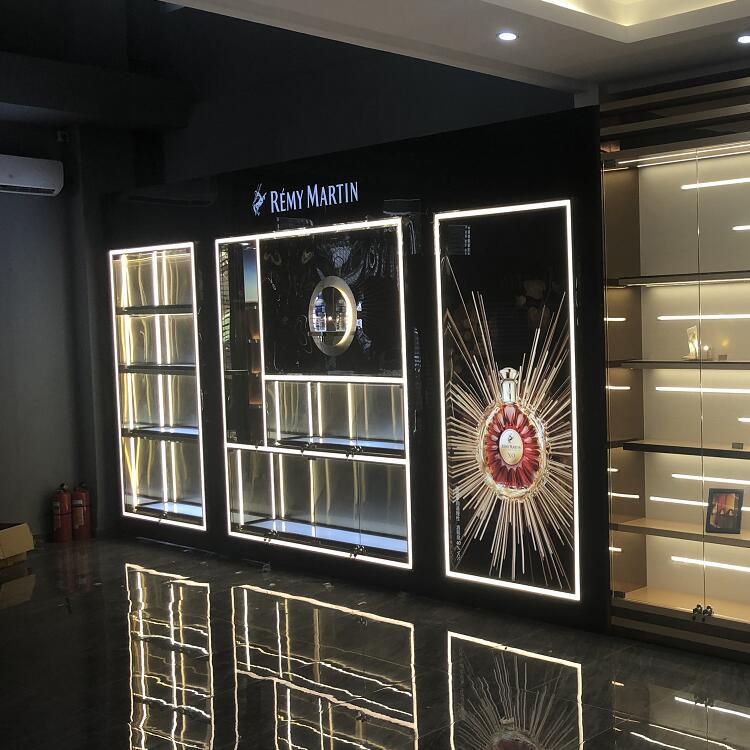 提供烟酒铺烤漆红酒展示柜海外洋酒展示柜精品发光效果展柜