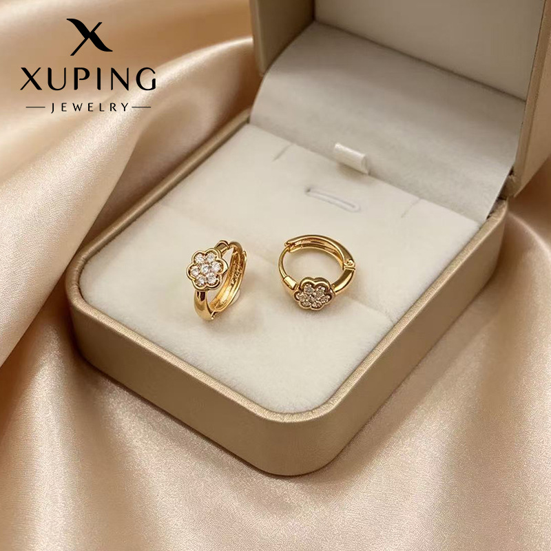 Xuping pequeña flor de estilo retro botones de orejas rusos de aleación de cobre chapado 18k simple transfronterizo orejas al por mayor mujeres
