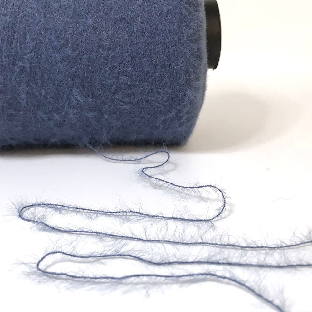 Fábrica de fuente cristal imitación de visón pluma hilo de especificaciones completas poliéster de nylon mitad de laterales jersey suéter bufandas
