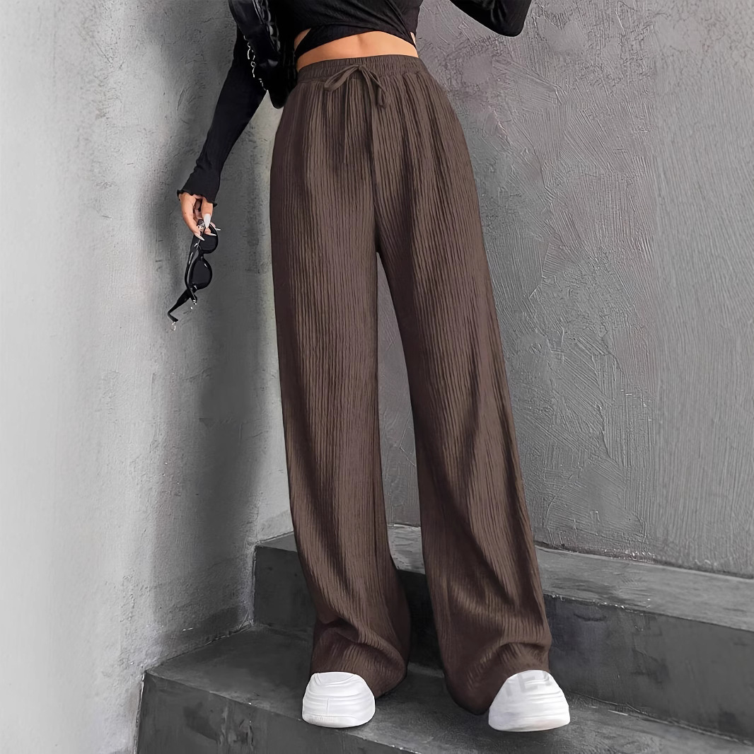 Pantalones largos informales de color liso para mujer, estilo europeo y americano, de corte cruzado, ideales para otoño e invierno de 2024._voghion.com