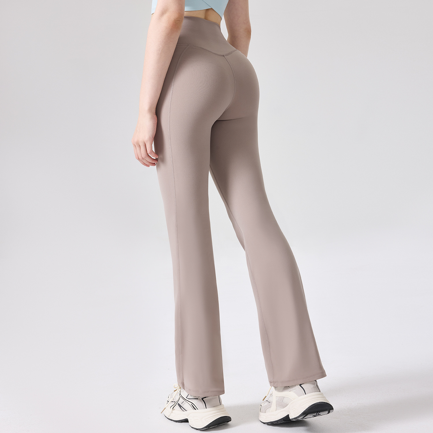 N66 clase Laica desnuda sensación de yoga pantalones de campana con etiqueta de suspensión de cintura alta caderas pantalones deportivos de gimnasio pantalones de piernas de melonía