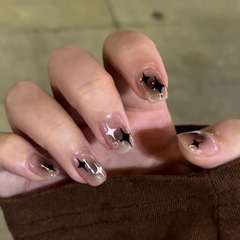 Brown ombre with black-and-white star accents—simple, luxe, Instagram-worthy short nails that are stylish, versatile, and perfect as faux nails.