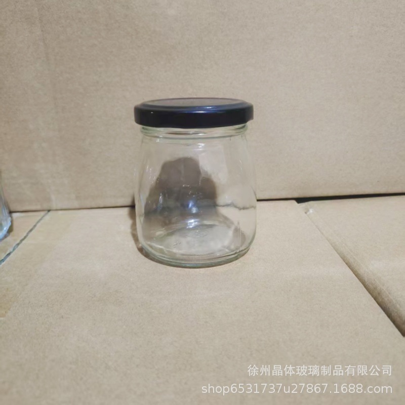 卸売り100mlガラス布丁瓶厚手牛乳カップ耐高温ヨーグルト瓶木栓ガラス瓶許瓶瓶